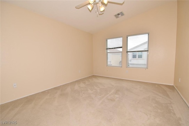8842 Duncan Barrel Ave Unit 101, Las Vegas, NV 89178 - unfurnished room featuring light colored carpet, lofted ceiling, a ceiling fan, and baseboards