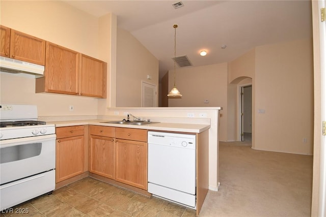 8842 Duncan Barrel Ave Unit 101, Las Vegas, NV 89178 - kitchen with white appliances, under cabinet range hood, a sink, a peninsula, and arched walkways
