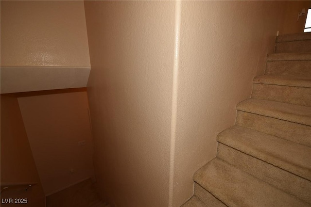 8842 Duncan Barrel Ave Unit 101, Las Vegas, NV 89178 - stairway featuring a textured wall