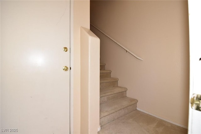 8842 Duncan Barrel Ave Unit 101, Las Vegas, NV 89178 - stairway featuring carpet flooring and baseboards