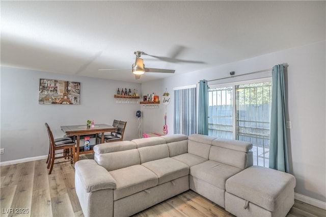 4078 Gold Coast Dr, Las Vegas, NV 89121 - living area featuring light wood-style floors, ceiling fan, and baseboards