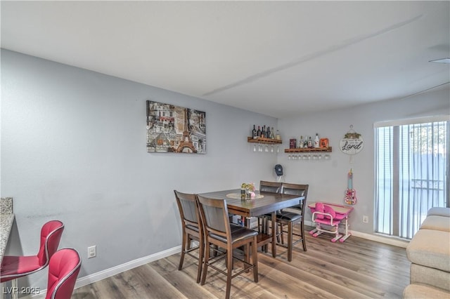 4078 Gold Coast Dr, Las Vegas, NV 89121 - dining room with wood finished floors and baseboards