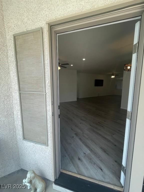 doorway to property with stucco siding