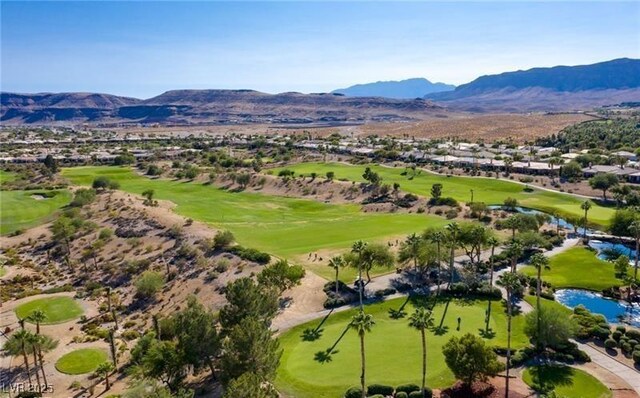 aerial perspective of suburban area with a golf club and a water and mountain view