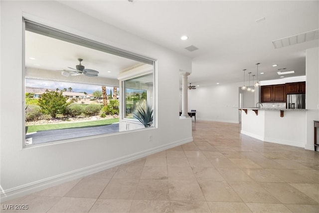 5067 Pensier St, Las Vegas, NV 89135 - unfurnished living room with recessed lighting, light tile patterned floors, and ceiling fan