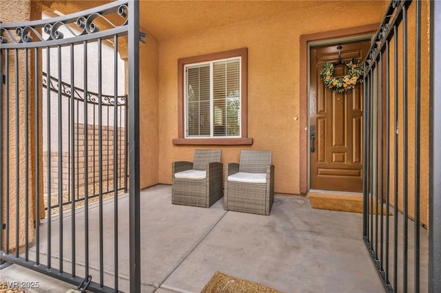 view of patio / terrace featuring a gate