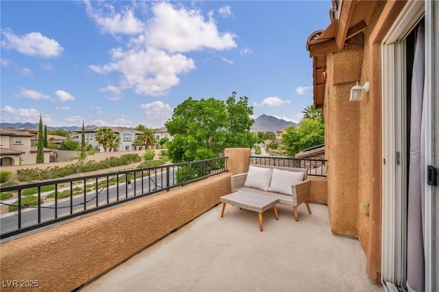 balcony with a mountain view and a residential view