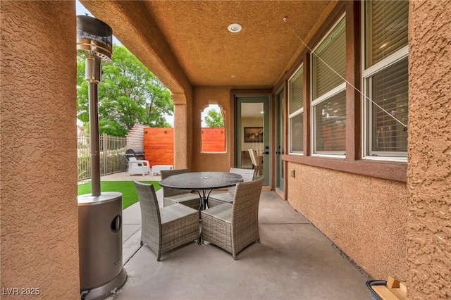 view of patio / terrace with fence and outdoor dining space
