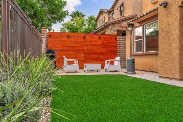 view of yard with a patio area