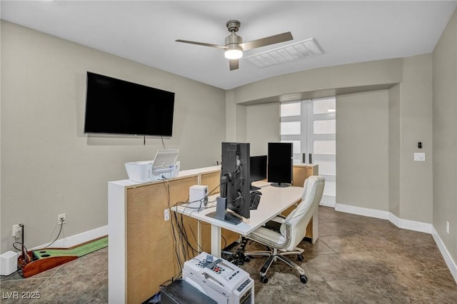 home office with ceiling fan and baseboards