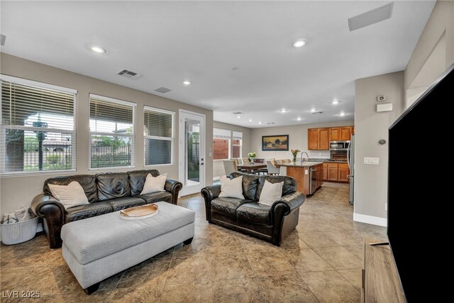 617 Apricot Rose Pl, Las Vegas, NV 89138 - living area with recessed lighting and light tile patterned floors