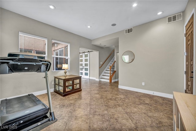 617 Apricot Rose Pl, Las Vegas, NV 89138 - exercise room featuring a barn door and recessed lighting