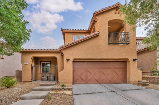 617 Apricot Rose Pl, Las Vegas, NV 89138 - mediterranean / spanish house featuring a tiled roof, a balcony, driveway, and stucco siding