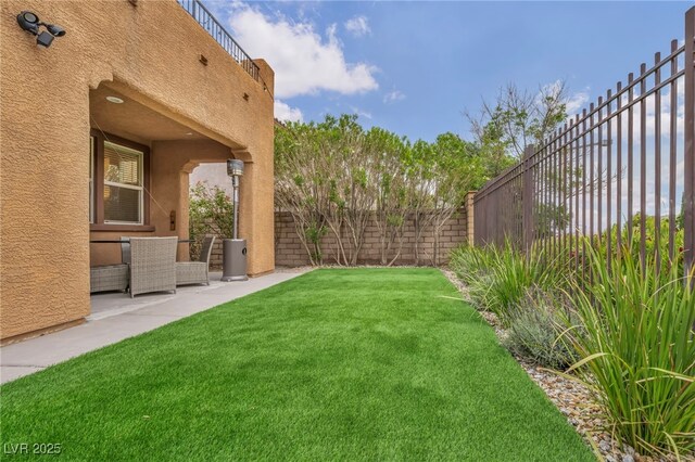 617 Apricot Rose Pl, Las Vegas, NV 89138 - fenced backyard featuring a patio area