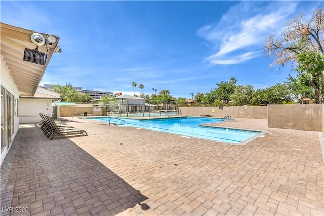 1553 Dorothy Ave Unit 4, Las Vegas, NV 89119 - community pool featuring a patio
