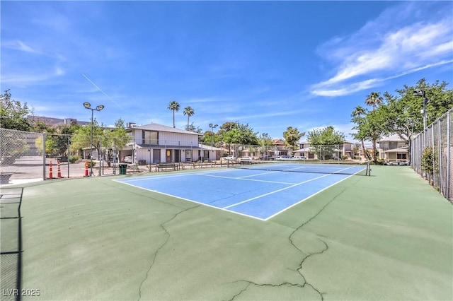 1553 Dorothy Ave Unit 4, Las Vegas, NV 89119 - view of tennis court with a residential view