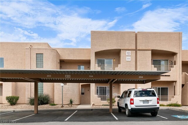 2232 Aspen Mirror Way Unit 202, Laughlin, NV 89029 - view of building exterior with covered parking