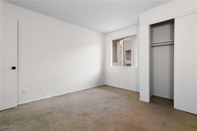 2232 Aspen Mirror Way Unit 202, Laughlin, NV 89029 - unfurnished bedroom featuring carpet floors and a closet