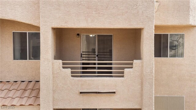 2232 Aspen Mirror Way Unit 202, Laughlin, NV 89029 - view of exterior entry featuring stucco siding