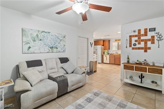 2213 Chandler Ranch Pl, Laughlin, NV 89029 - living area with ceiling fan and light tile patterned floors