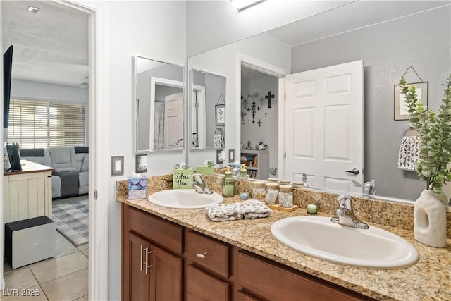 2213 Chandler Ranch Pl, Laughlin, NV 89029 - ensuite bathroom featuring double vanity and tile patterned flooring