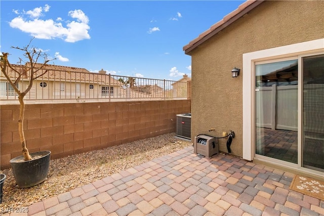 2213 Chandler Ranch Pl, Laughlin, NV 89029 - view of patio with fence and central AC