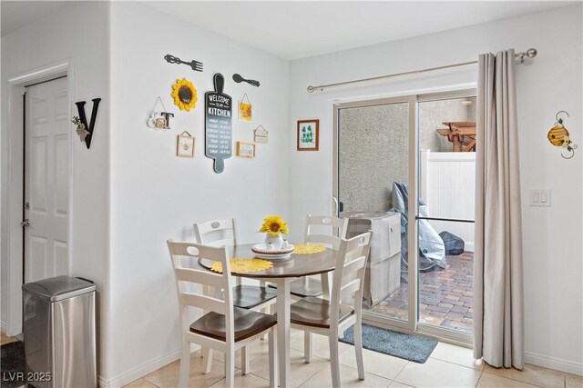 2213 Chandler Ranch Pl, Laughlin, NV 89029 - dining space with light tile patterned floors and baseboards