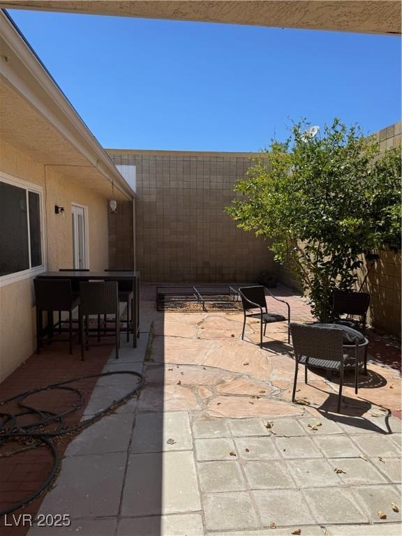 view of patio with fence
