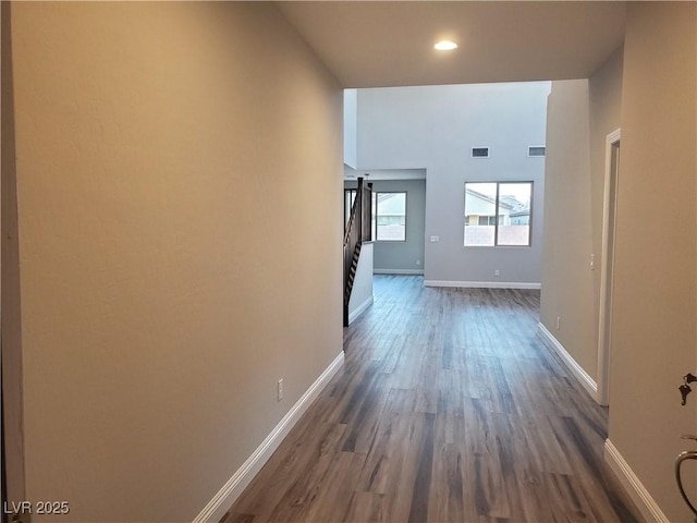 1027 Cambridge Park St, Las Vegas, NV 89148 - hall featuring dark wood finished floors, baseboards, stairs, and recessed lighting