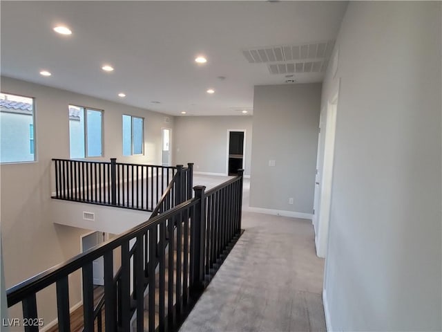 1027 Cambridge Park St, Las Vegas, NV 89148 - hall featuring an upstairs landing, recessed lighting, baseboards, and light carpet
