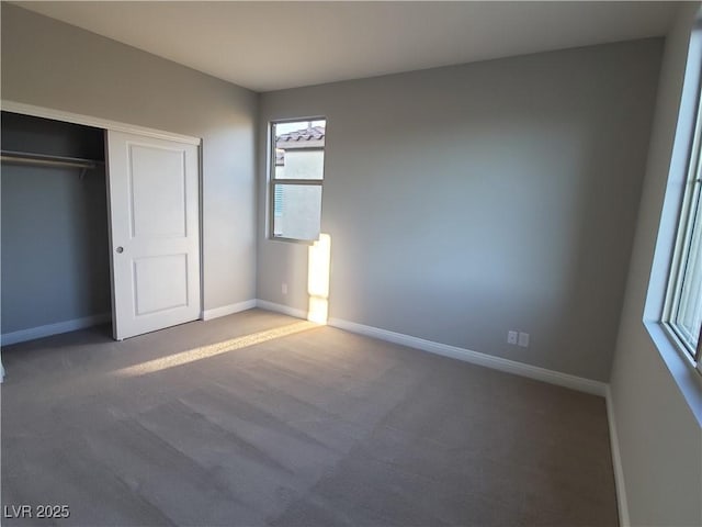 1027 Cambridge Park St, Las Vegas, NV 89148 - unfurnished bedroom featuring baseboards, a closet, and carpet floors