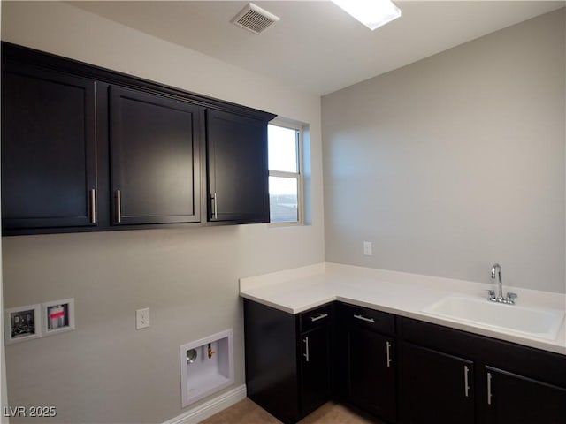 1027 Cambridge Park St, Las Vegas, NV 89148 - washroom with washer hookup, cabinet space, and baseboards