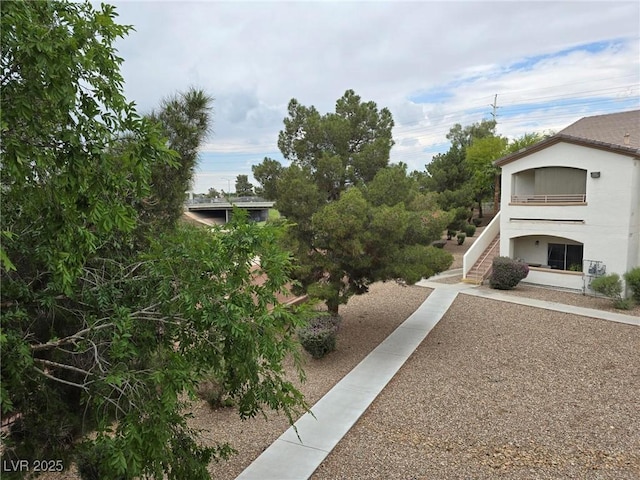 view of yard featuring stairs