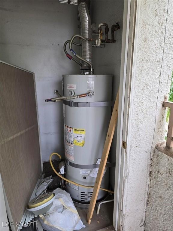 utility room with water heater