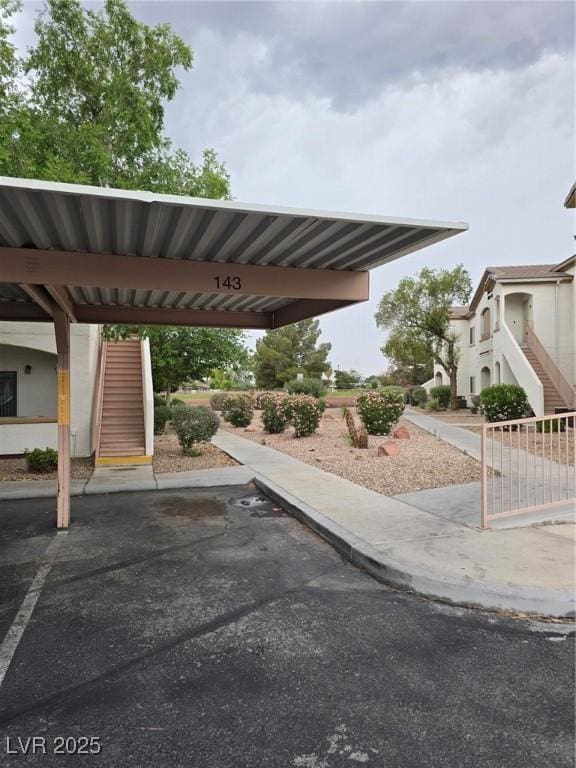 covered parking lot with stairway