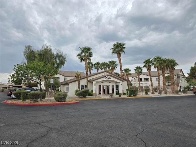 5655 E Sahara Ave Unit 2020, Las Vegas, NV 89142 - view of property with uncovered parking and a residential view