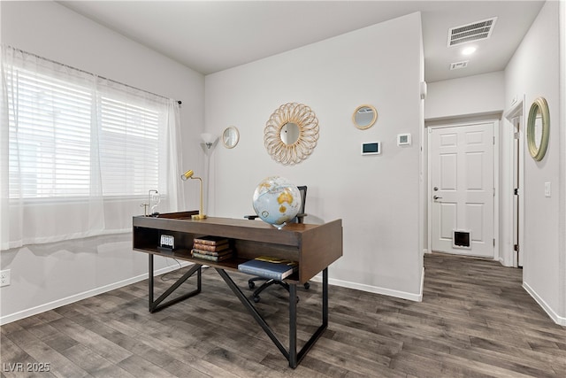 home office featuring dark wood finished floors and baseboards