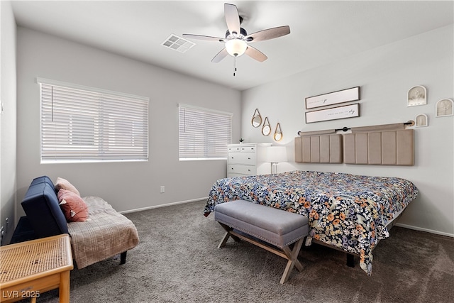 carpeted bedroom with baseboards and ceiling fan