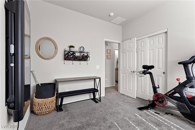 exercise area with carpet flooring