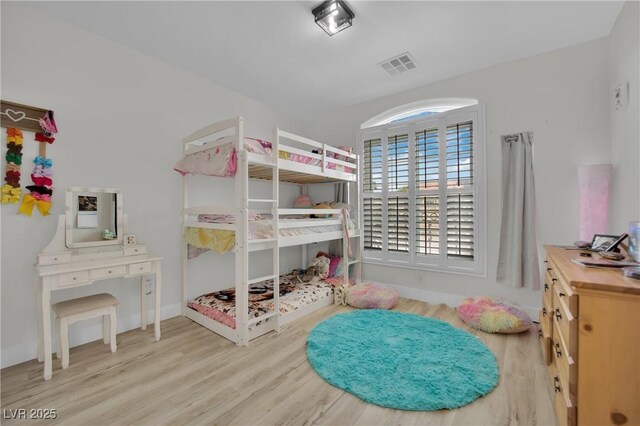 7211 Heggie Ave, Las Vegas, NV 89131 - bedroom with wood finished floors and baseboards