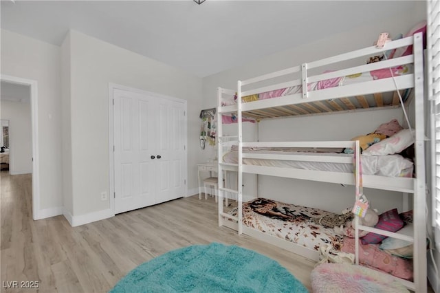 7211 Heggie Ave, Las Vegas, NV 89131 - bedroom with wood finished floors, baseboards, and a closet
