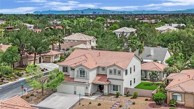 7211 Heggie Ave, Las Vegas, NV 89131 - aerial view of residential area with a mountainous background