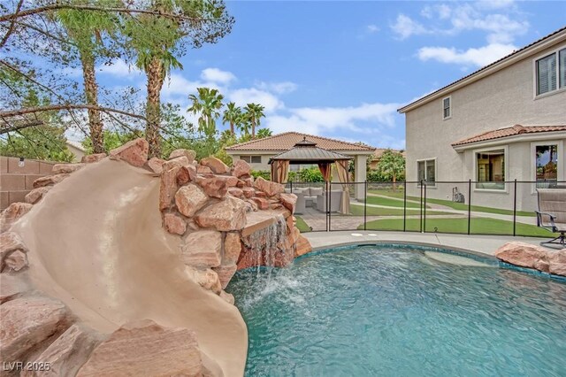 7211 Heggie Ave, Las Vegas, NV 89131 - view of pool featuring a gazebo, a patio, and fence