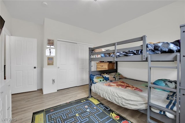 7211 Heggie Ave, Las Vegas, NV 89131 - bedroom featuring light wood-style floors and a closet
