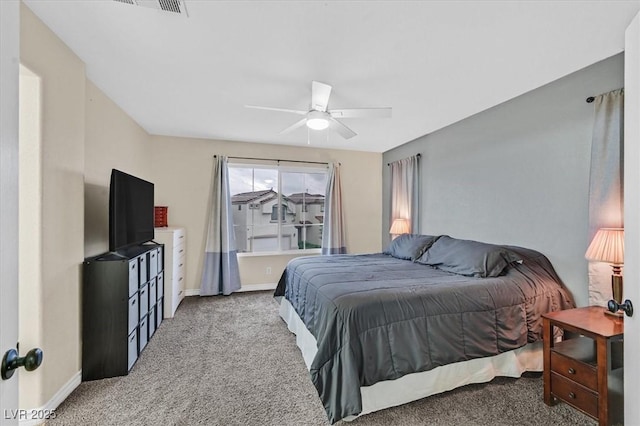 4820 Integrity St, North Las Vegas, NV 89031 - bedroom with carpet flooring, baseboards, and a ceiling fan