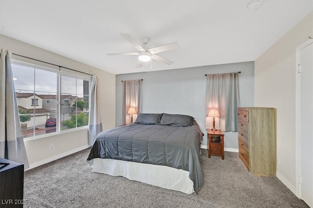 4820 Integrity St, North Las Vegas, NV 89031 - carpeted bedroom with baseboards and a ceiling fan