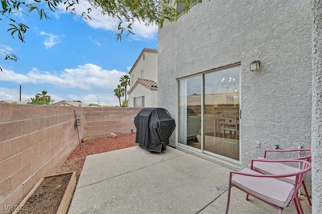 4820 Integrity St, North Las Vegas, NV 89031 - view of patio / terrace featuring grilling area and a fenced backyard