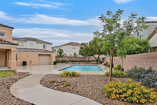4820 Integrity St, North Las Vegas, NV 89031 - view of pool with fence and a patio area