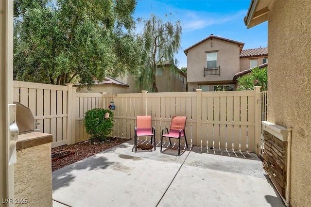 view of patio featuring a fenced backyard