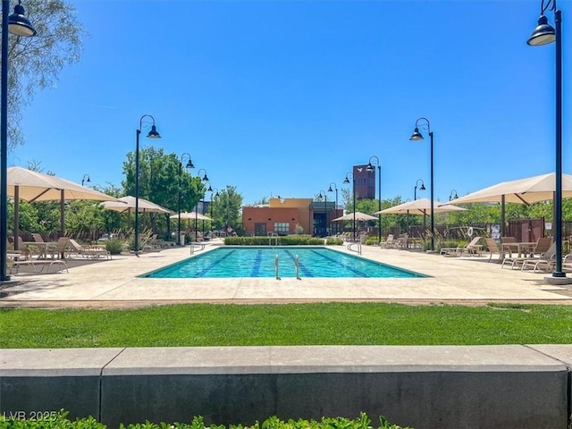 community pool with a patio